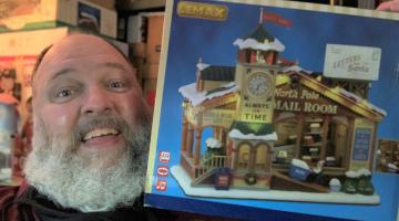 Doug Bowen with one of the winter village display decorations