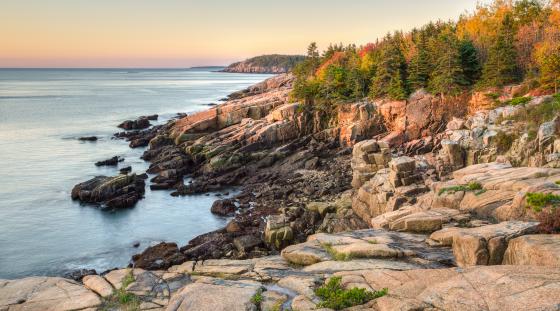 Scenic rocky coastline at sunset landscape