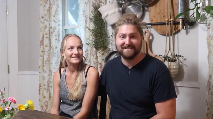 Mikayla and Vinny Fischer sit at their kitchen table as they discuss his upcoming participation in the 2022 Amputee Football World Cup.