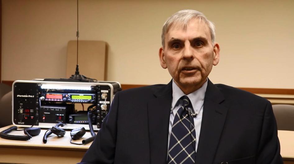 A HAM radio volunteer with his radio