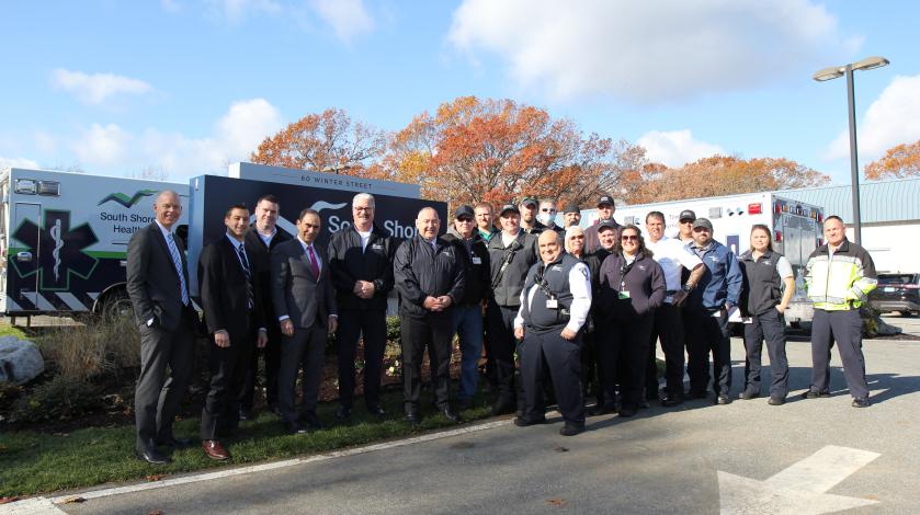South Shore Health's EMS Team poses in front of the new EMS Operations Facility in Weymouth.