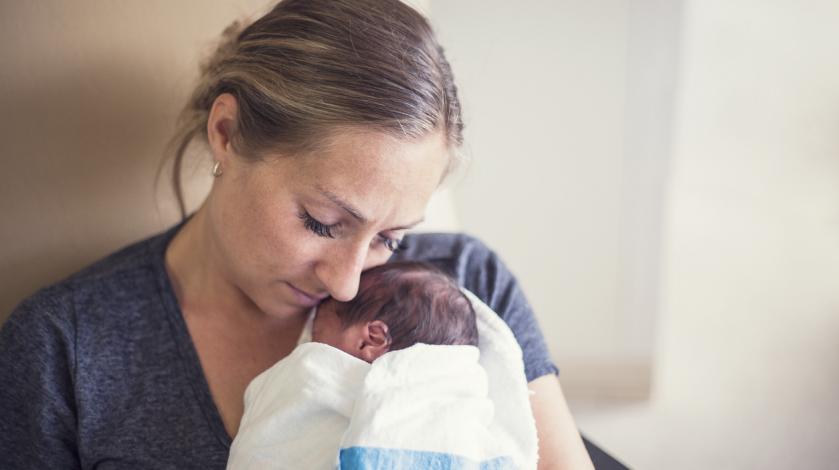 A mother with a sick infant