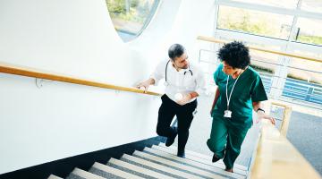 Hospitalist and another doctor talking