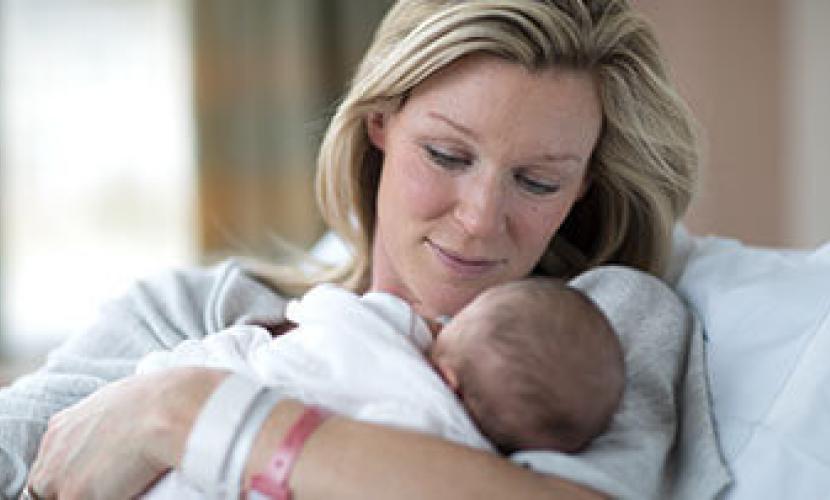 woman holding a baby
