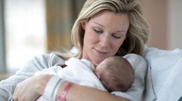 woman holding a baby