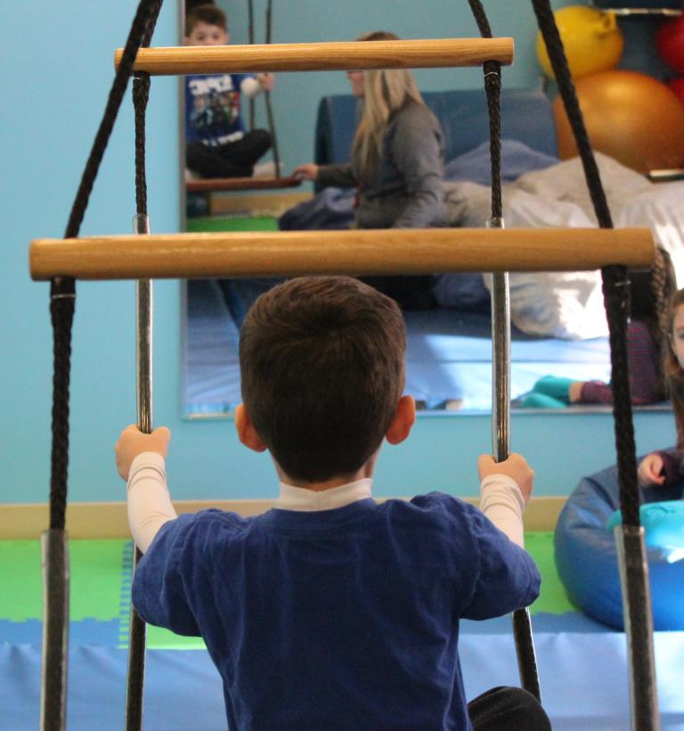Luke Creedon does occupational therapy with Crystal Cote at South Shore Health